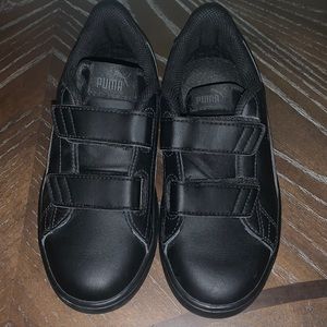 Black Puma sneakers